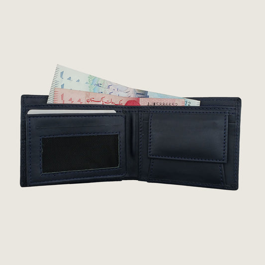 A dark navy blue leather bi-fold wallet shown open, displaying its interior compartments, including a card slot with banknotes inserted, a black mesh ID window, and blank card slots, set against a solid light beige background.