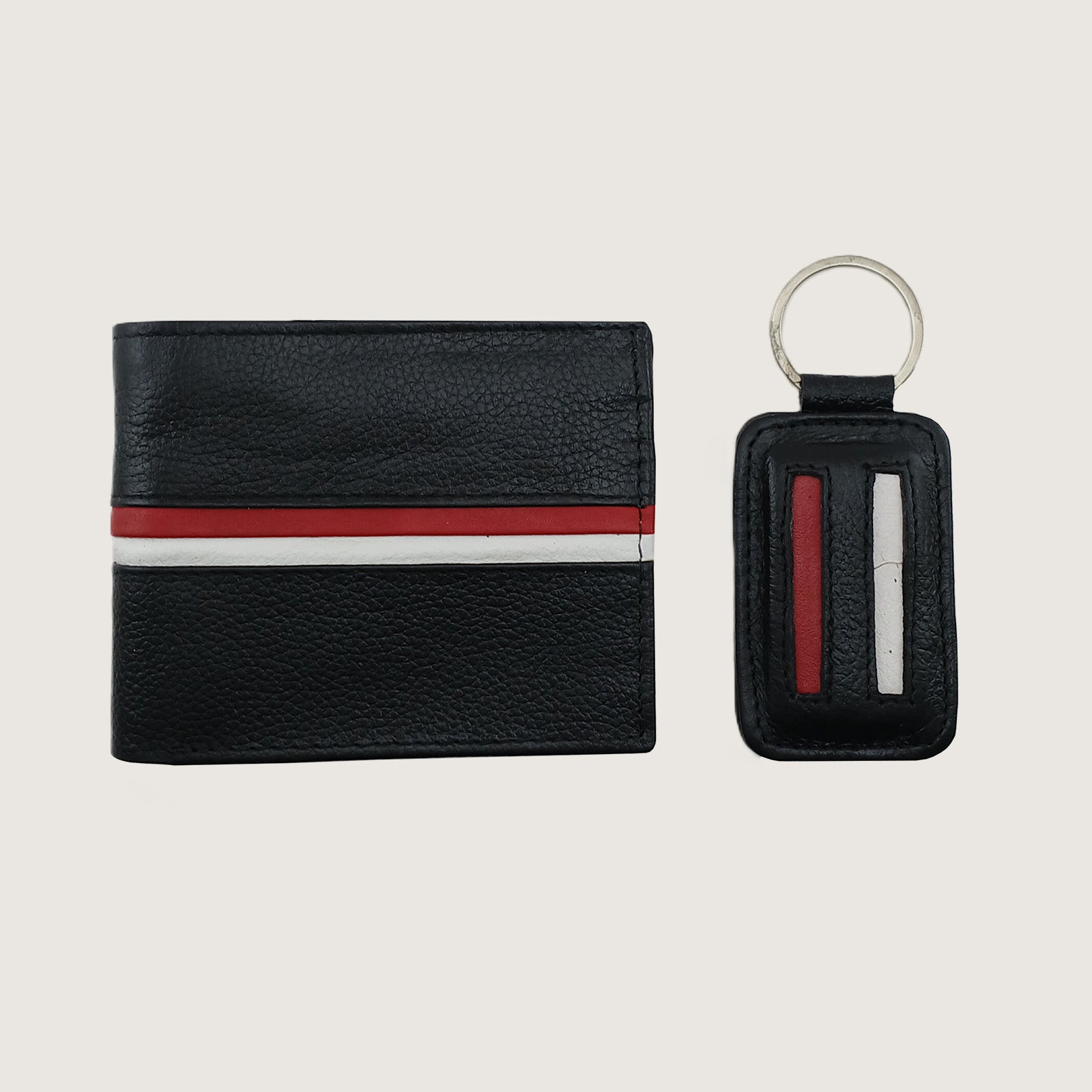 Black textured leather wallet and matching keychain set with a red and white stripe detail, shown on a light gray background.