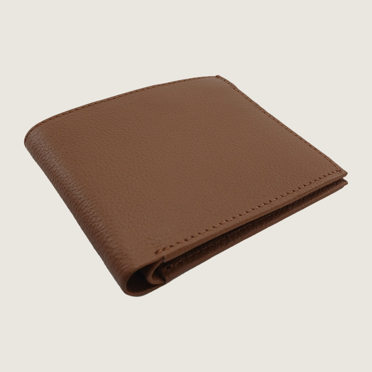 A brown textured leather bifold wallet shown closed at an angle on a light beige background.