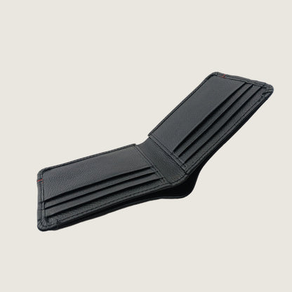 A black textured leather bifold wallet shown open, displaying multiple card slots and an interior pocket, set against a solid light beige background.
