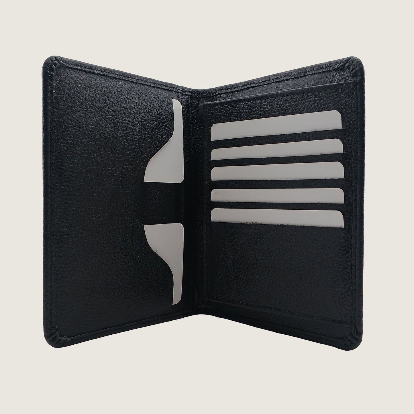 An open black leather bifold wallet with five card slots and a cardholder pocket on the inside, shown against a light beige background.