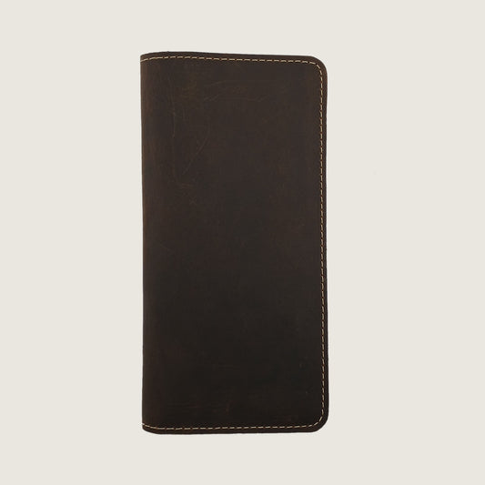 A dark brown leather wallet or card holder with light tan contrast stitching, shown flat against a light beige background.