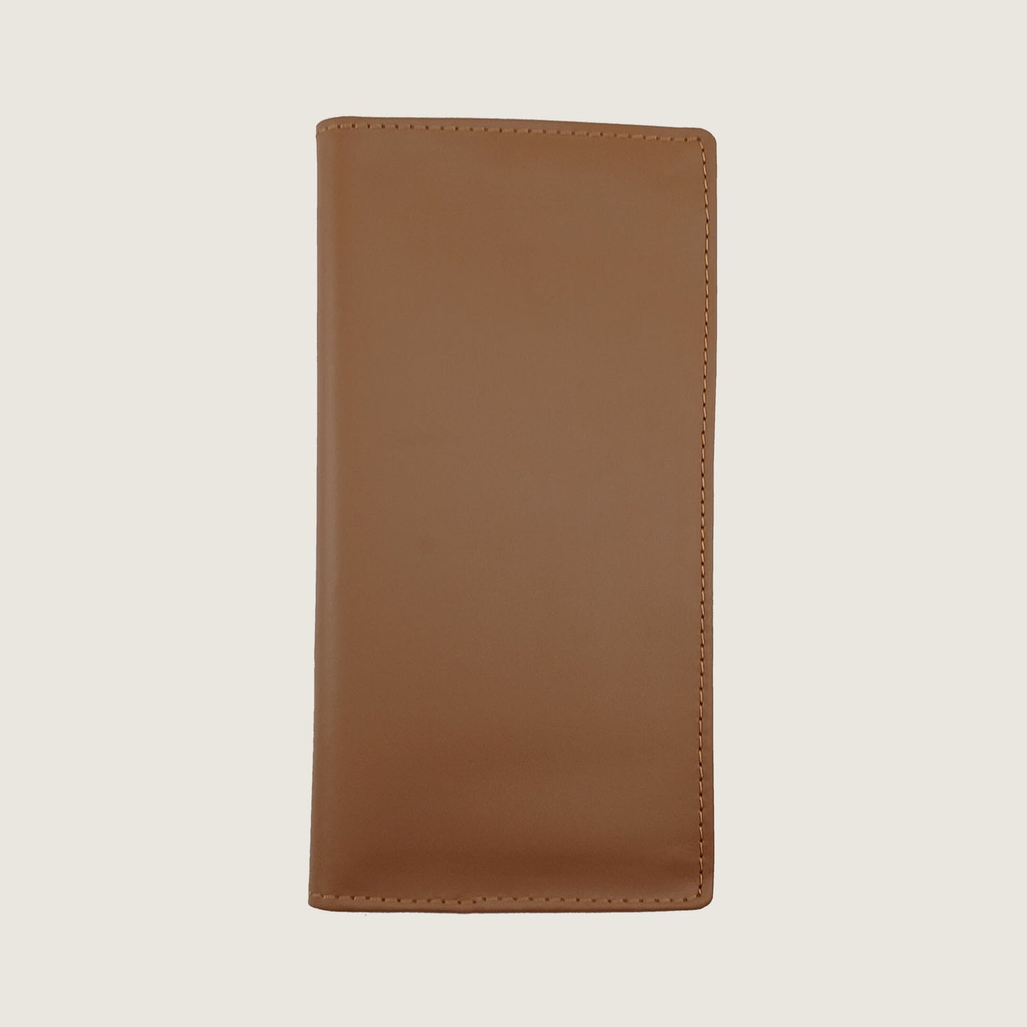 A plain brown leather wallet  cover shown closed against a light warm gray background.