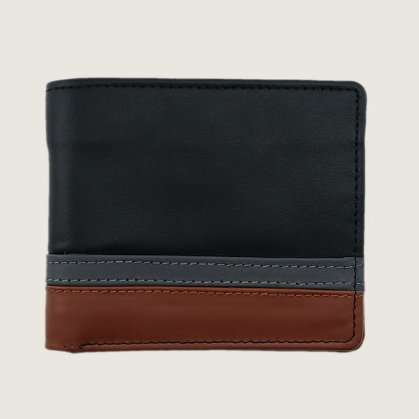 A color-blocked bifold wallet made of leather, featuring a large black upper section, a gray middle stripe with white stitching, and a brown lower section, shown on a light beige background.